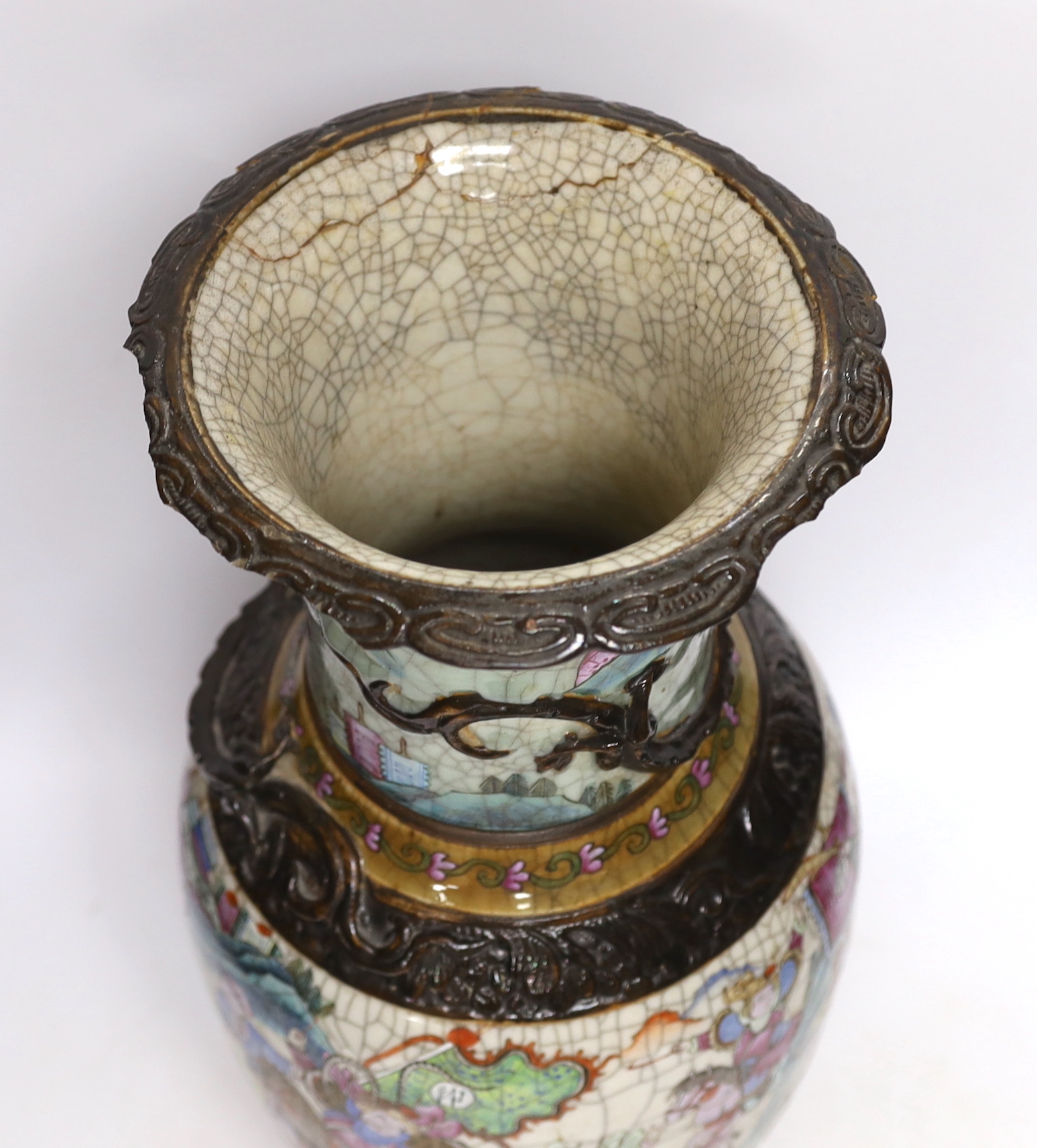 A Chinese famille rose crackle glaze 'warriors' vase, late 19th century, 46cm high, cracked